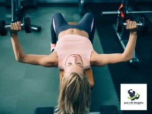 girl doing dumbbell chest presses