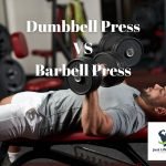 guy pushing dumbbells