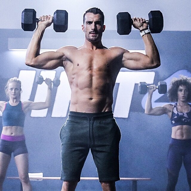 joel lifting dumbbells 